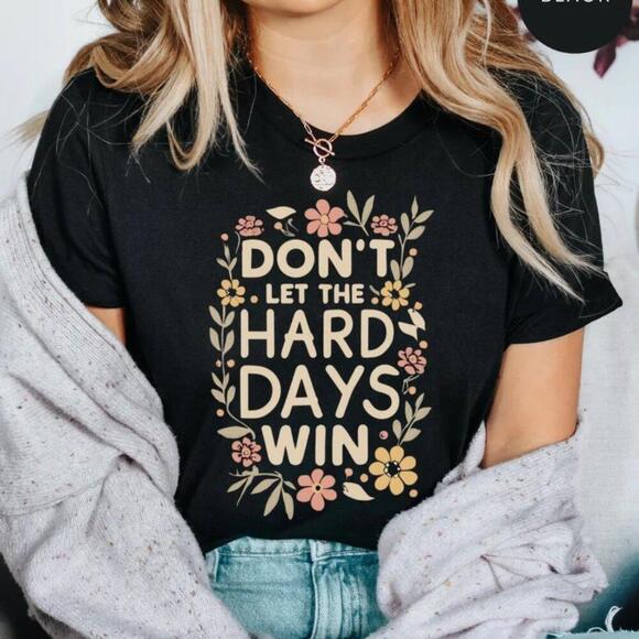 Michelle
L Other - DonT Let The Hard Days Win Shirt, Officially Licensed, T Shirt